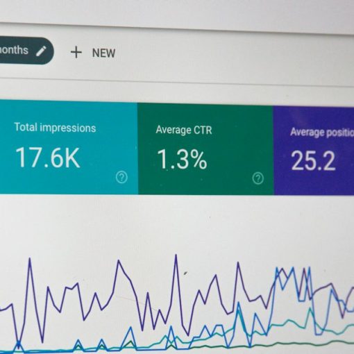 Monitor displaying an analytics dashboard with charts, illustrating key cloud computing statistics