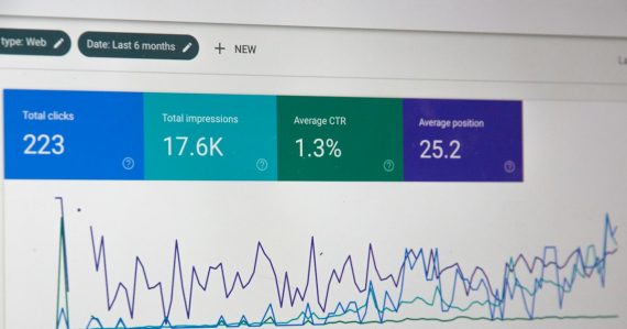 Monitor displaying an analytics dashboard with charts, illustrating key cloud computing statistics