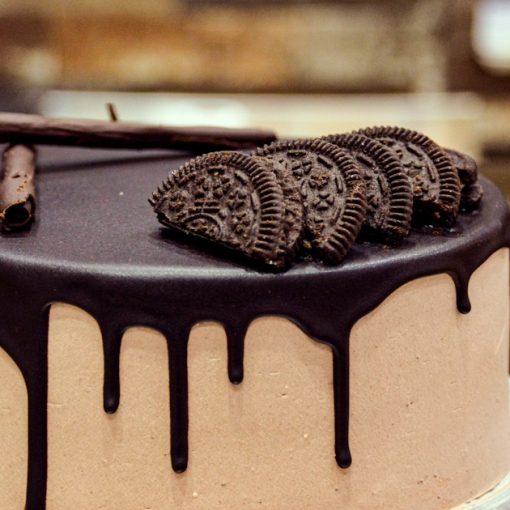 Layered chocolate cake with chocolate syrup on top, illustrating layers of virtualization