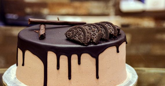 Layered chocolate cake with chocolate syrup on top, illustrating layers of virtualization