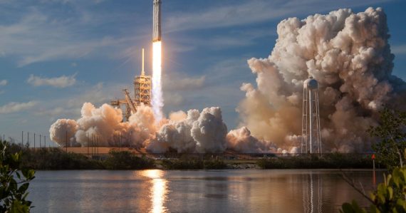 Gray spacecraft taking off during daytime, illustrating meshIP launching new services