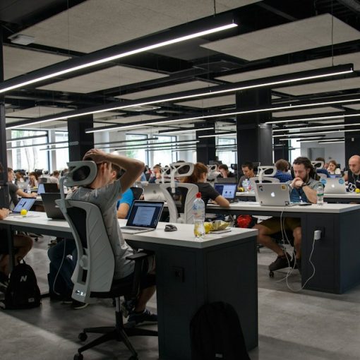 People working in an office, illustrating midmarket cloud computing adoption