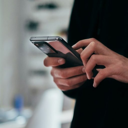 Person holding black android smartphone, illustrating mobile cloud use growth