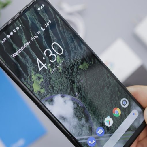 Person holding black android smartphone, illustrating virtualized Android phones