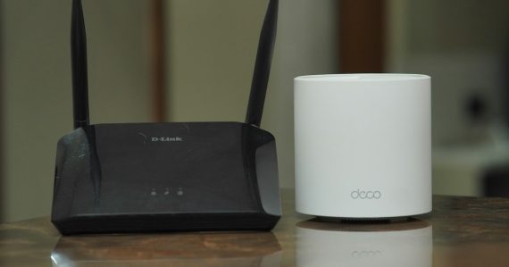 A couple of routers sitting on a table, illustrating preparing your network for the cloud