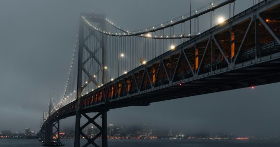 The Bay Bridge in thick fog in San Francisco, illustrating overcoming doubts about cloud computing