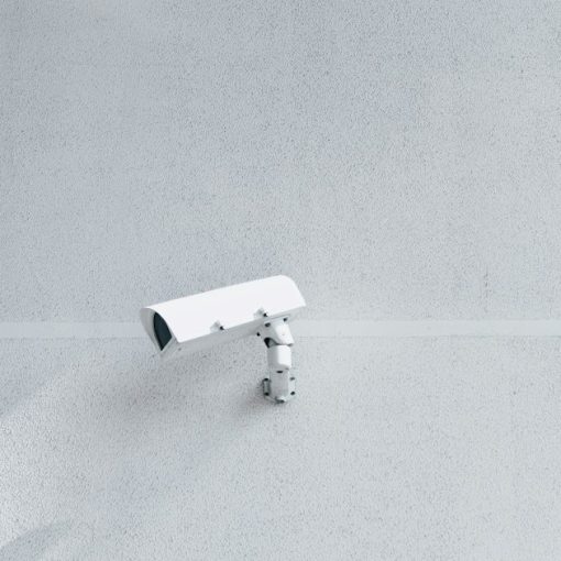 White box security camera on wall, illustrating overlooked cloud security threats