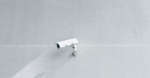 White box security camera on wall, illustrating overlooked cloud security threats