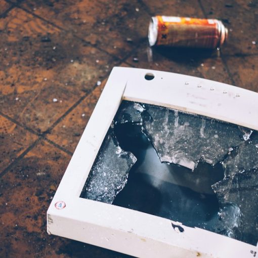 Shattered monitor on the floor, illustrating a Windows patch breaking VMware View
