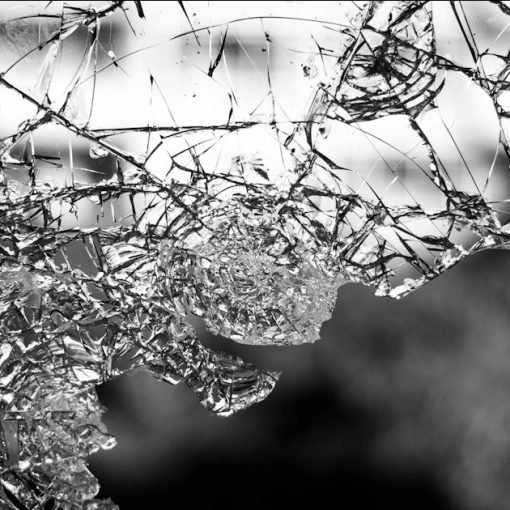 Close up of cracked glass, illustrating the flawed concept of private cloud