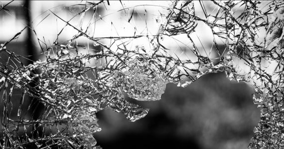 Close up of cracked glass, illustrating the flawed concept of private cloud