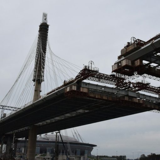 Low-angle photography of a bridge during daytime, illustrating private cloud as a stepping stone