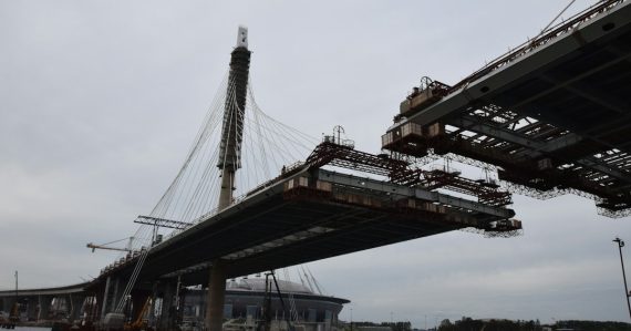 Low-angle photography of a bridge during daytime, illustrating private cloud as a stepping stone