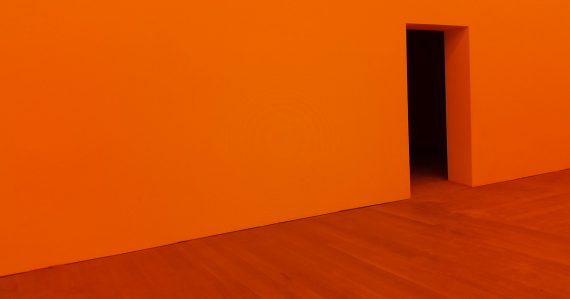 Orange room with open door, illustrating customers not securing the cloud