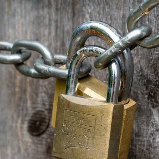 Brown padlock on brown wooden fence, illustrating secure cloud computing research tools