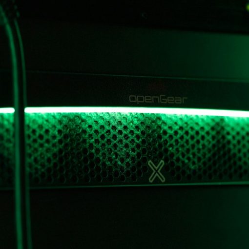 A close up of a green light in a server, illustrating security for sensitive cloud data
