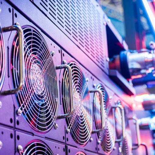 Close-up of server cooling fans in a vibrant data center, illustrating server application virtualization
