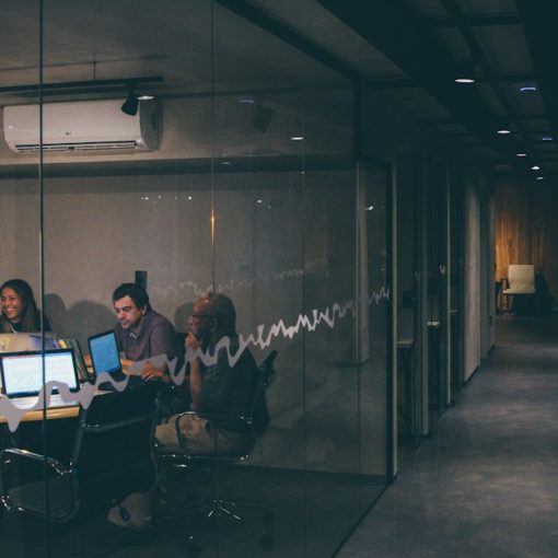 Group of people having a meeting, illustrating cloud computing decisions for small businesses