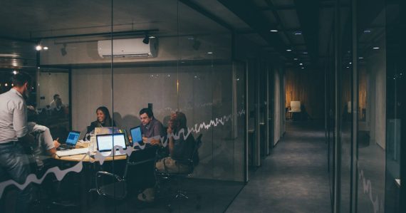 Group of people having a meeting, illustrating cloud computing decisions for small businesses