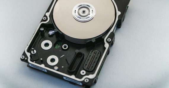 Silver and black hard disk drive, illustrating SMB data protection and backup