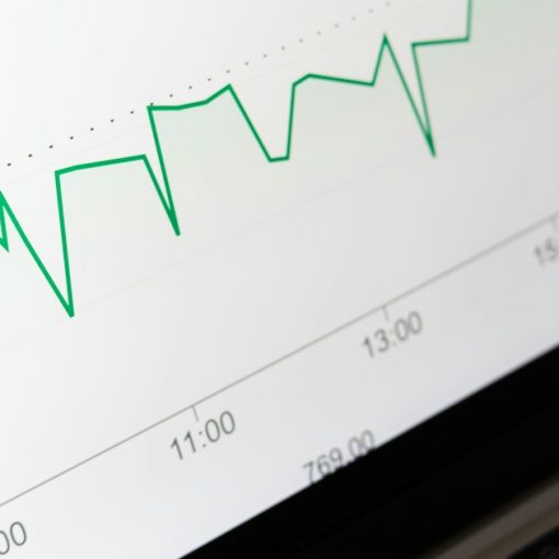 Stock market chart displayed on laptop screen, illustrating increased spending on cloud computing