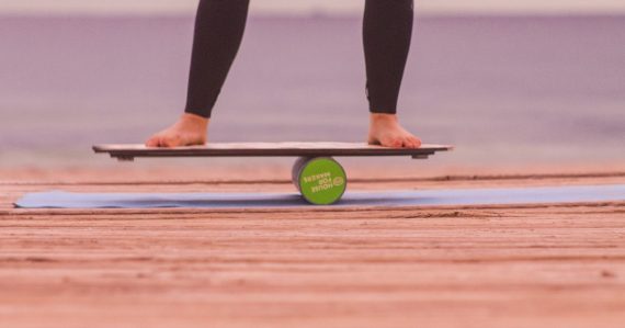 Person on balance board, illustrating desktop virtualization tipping point