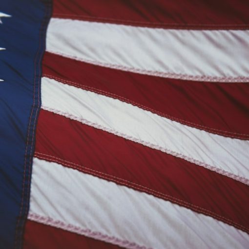 The American flag with white stars and red and white stripes, illustrating the VA email cloud migration