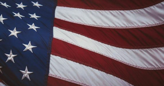 The American flag with white stars and red and white stripes, illustrating the VA email cloud migration