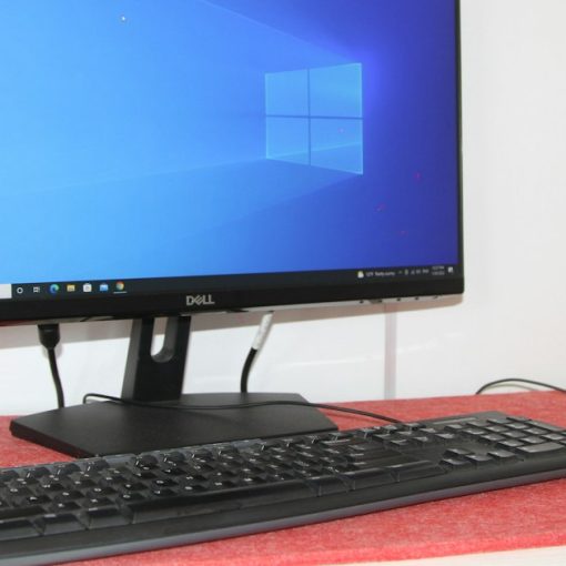 A desktop computer with a keyboard and mouse, illustrating VDI changing desktop management