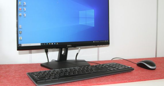 A desktop computer with a keyboard and mouse, illustrating VDI changing desktop management