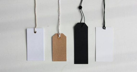 Four paper card tags, illustrating Microsoft VDI licensing costs