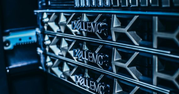A close up of server nameplates on the side of a rack, illustrating virtualisation market growth