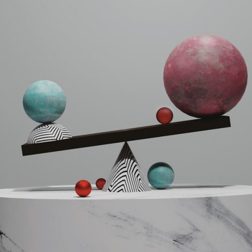 Balance scale with spheres on a marble pedestal, illustrating virtualization as the big equalizer