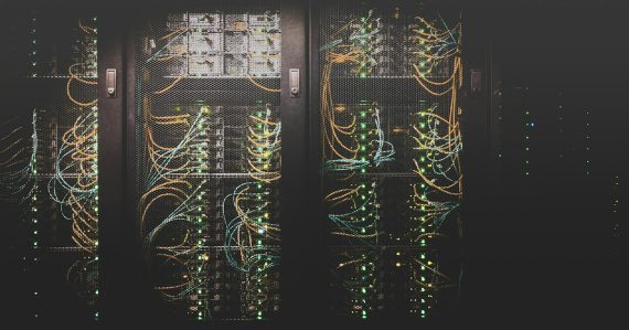 Network cables in a server rack, illustrating virtualization versus a private cloud