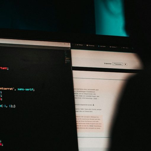 Flat screen computer monitor displaying white and black screen, illustrating VoIP hacker attacks visualized