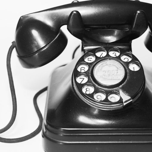 Photo of black rotary telephone, illustrating VoIP phreaking