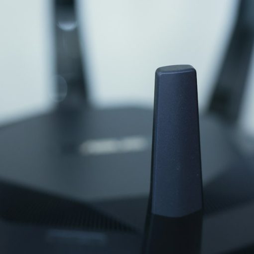 A close-up of a wireless router, illustrating network and VoIP security tips