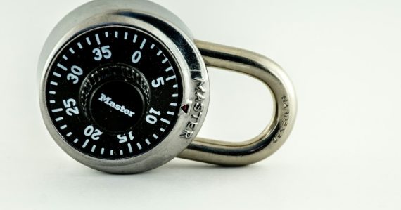 Silver and black combination lock, illustrating VoIP security