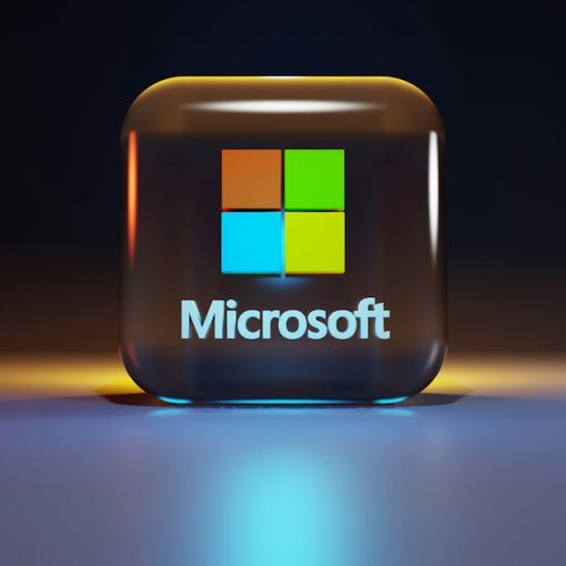 A glossy glass cube with the Microsoft logo on a dark surface, illustrating Microsoft's confusingly named Live products
